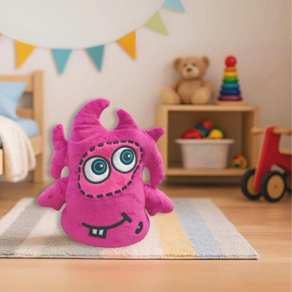 CwaZyBean Aliens Lagion Award Winning Pink plush toy from CwaZyLeigh CreaTions with large eyes in a child's room with toys and furniture.